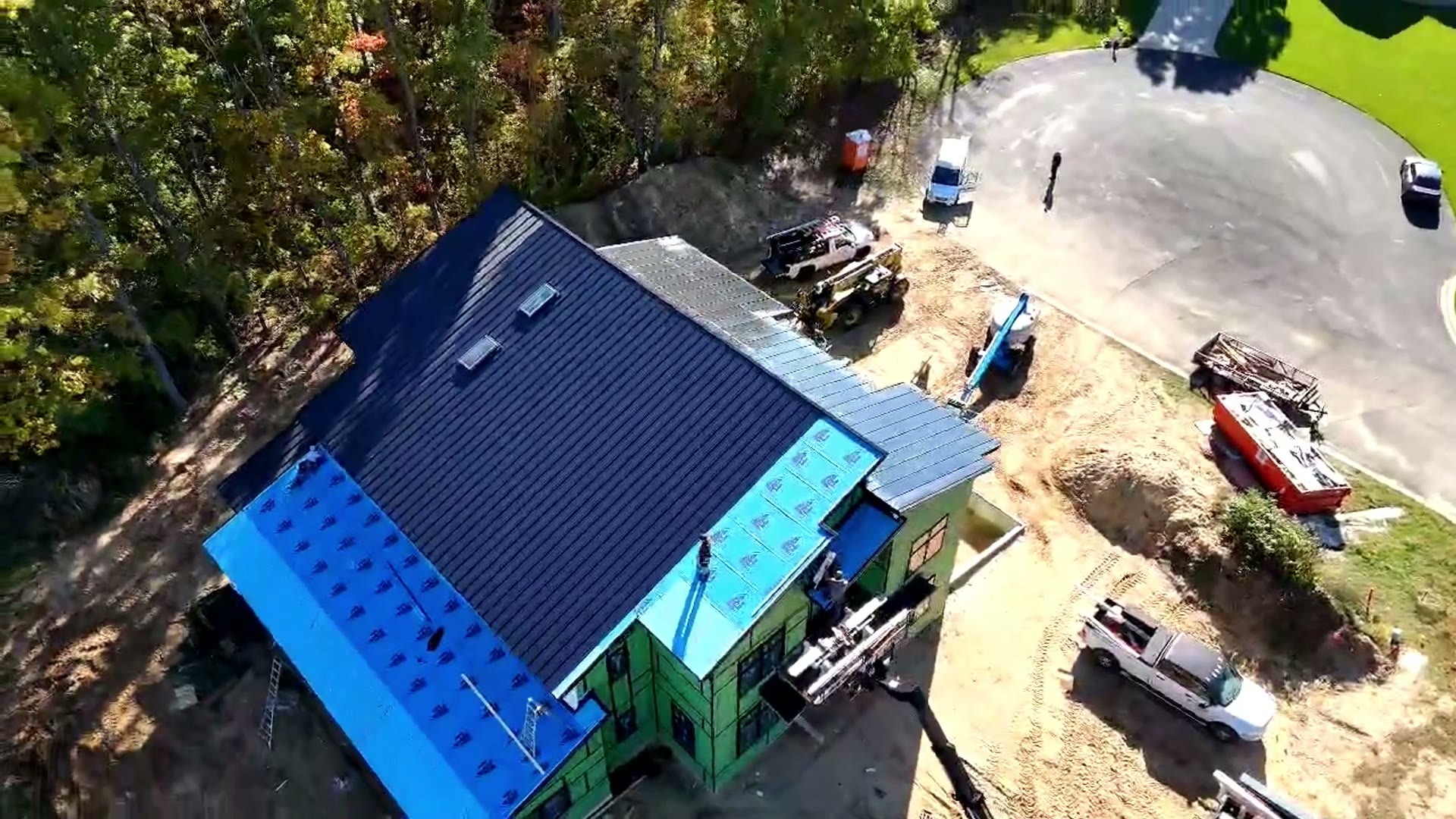 ArcEdge crew installing an integrated solar metal roof in Kalamazoo, Michigan