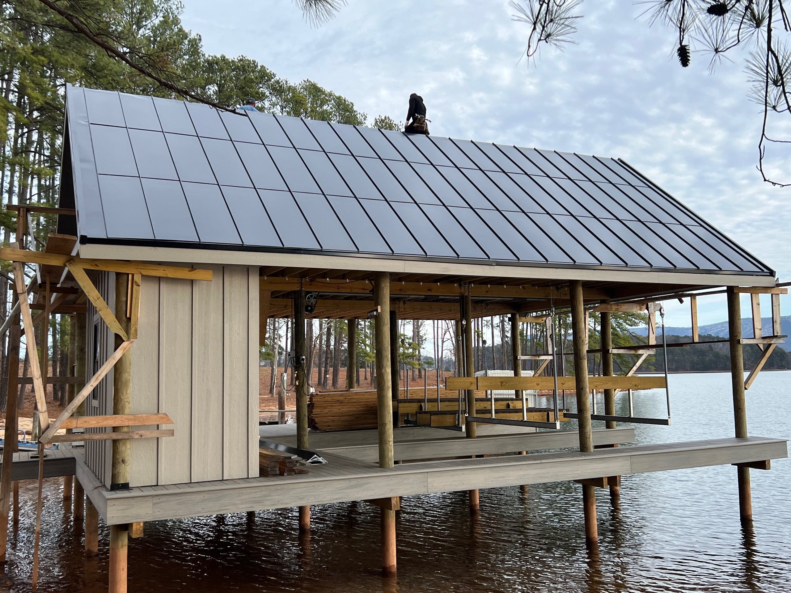 Boathouse at Smith Mountain Lake, Virginia with an ArcEdge integrated solar roof going on