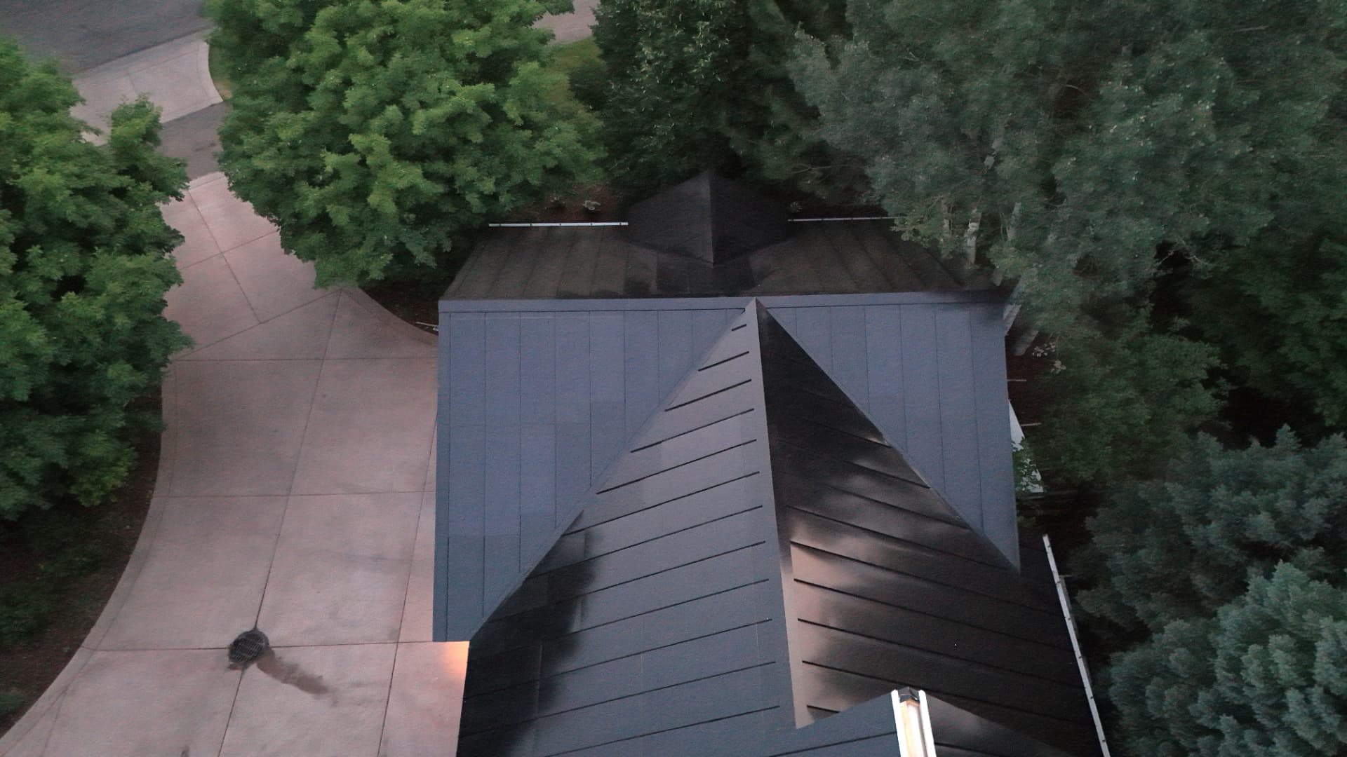 Overhead view of a black integrated solar roof on a Carbondale, Colorado garage